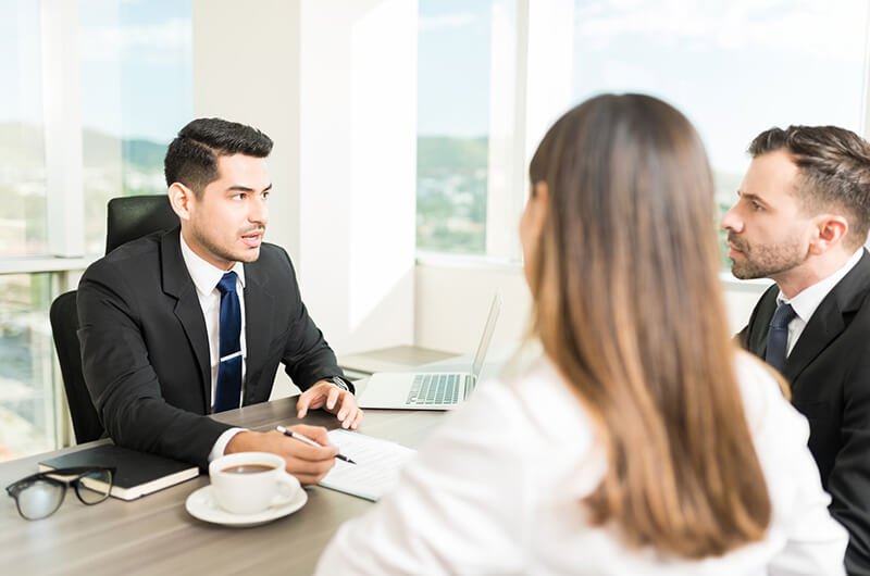 planner meeting with clients - certified financial planners farmington connecticut