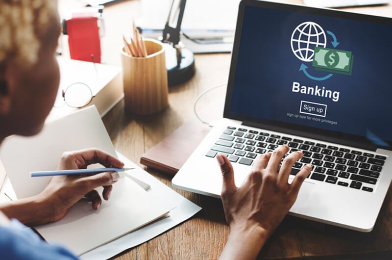 bank signup on laptop - how to choose a bank - financial planning services farmington ct