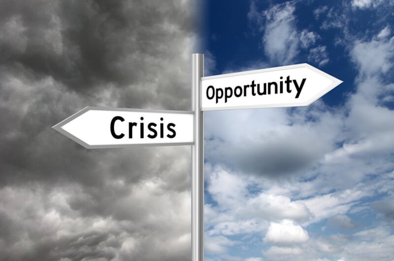 crisis opportunity recession directional sign - financial planning & investment services farmington