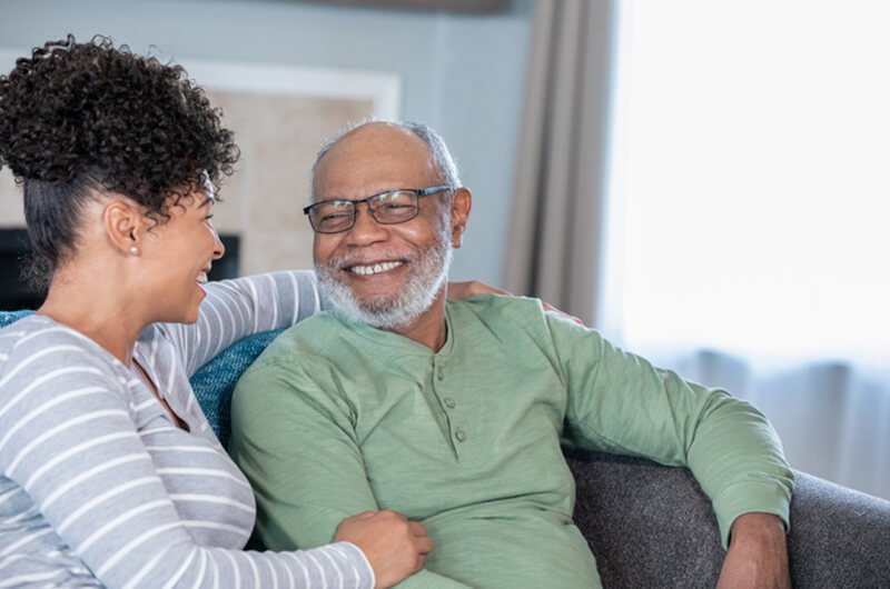 woman visiting father - best rated financial retirement planning services in farmington CT