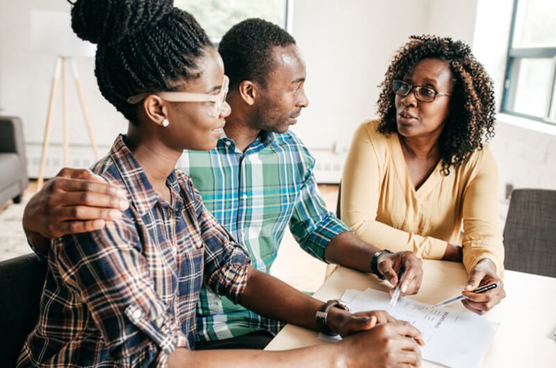 financial advisor consulting with couple - we provide financial planning services farmington ct
