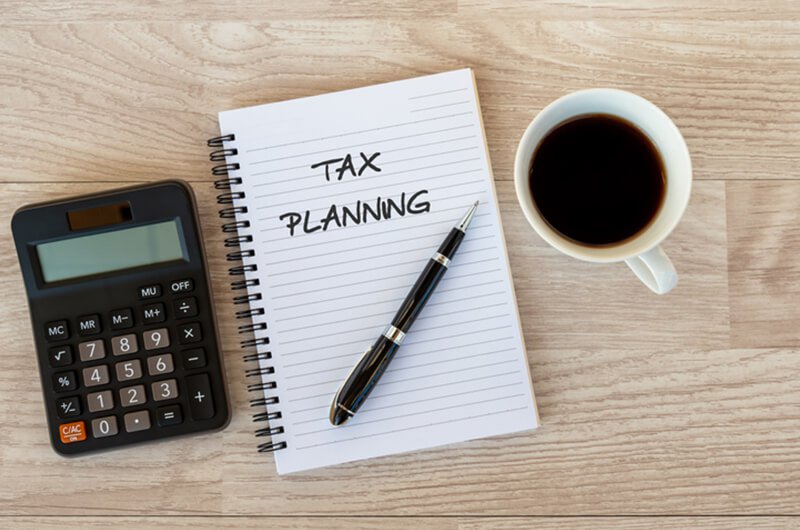 tax planning text on notepad - protect estate from taxes - financial planning services farmington