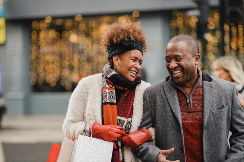 happy black couple outdoors - retirement planning and budgeting services in farmington CT
